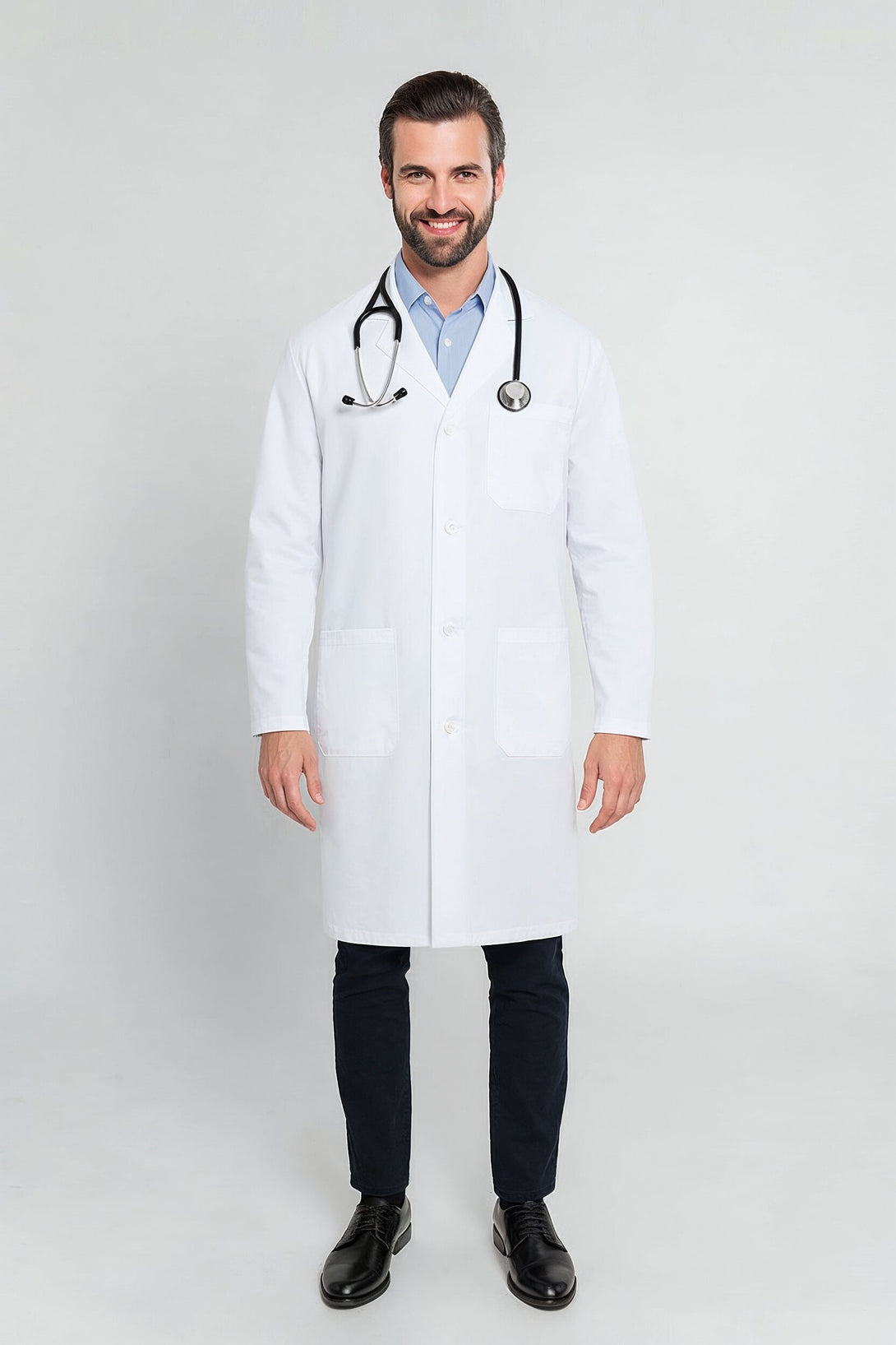 Man wearing a white lab coat on a light gray background